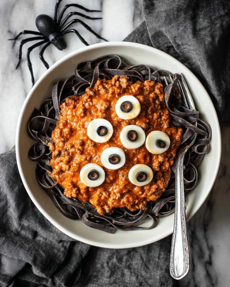 Halloween Black Ink Pasta with Spooky Beef Ragu and Mozzarella Eyeballs Recipe