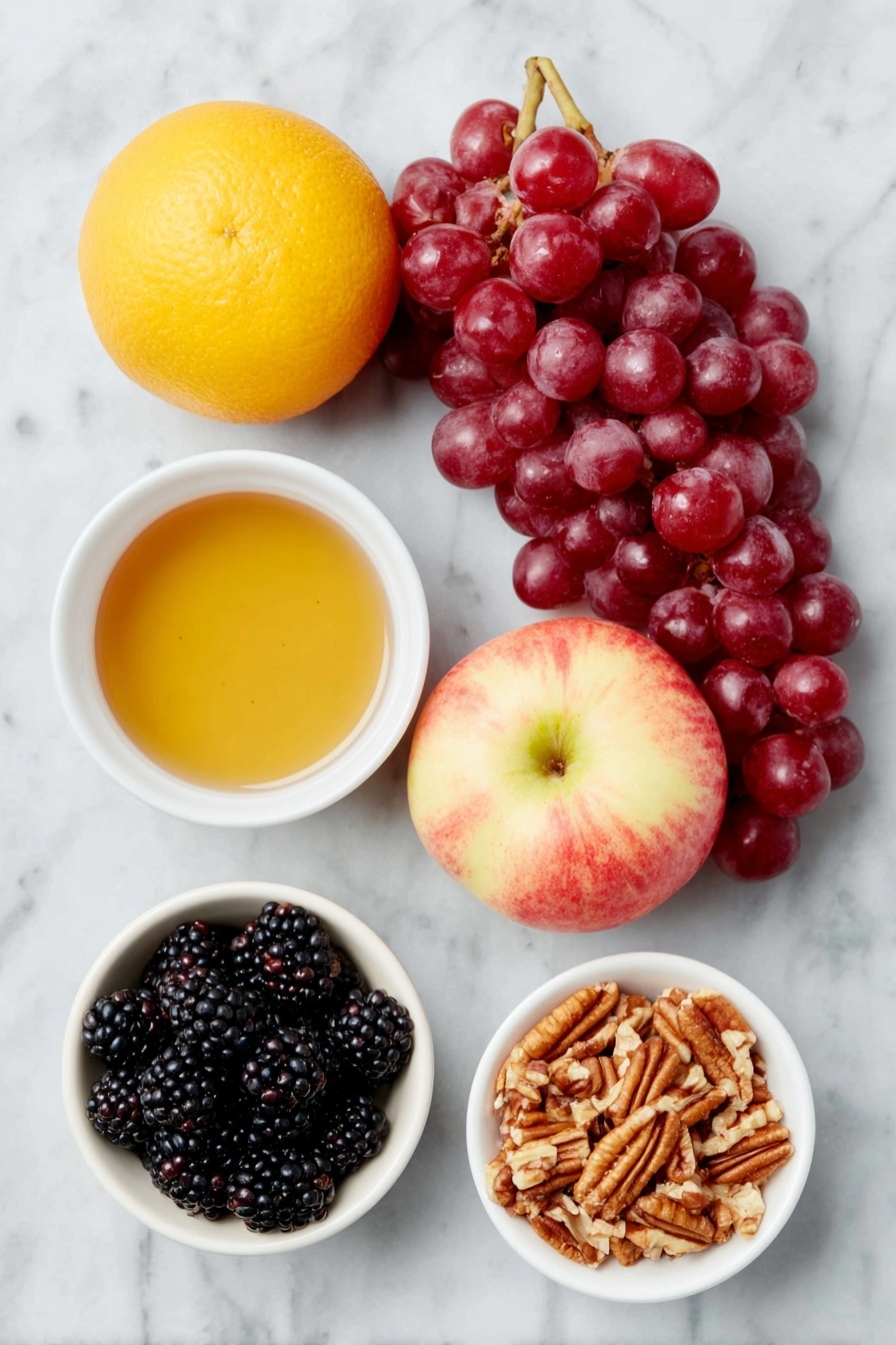 Fall Fruit Salad, fall fruit salad ideas, seasonal fruit salad, healthy fall dessert, easy fruit salad recipe - Flat lay of a whole bright orange, a small white ceramic bowl filled with amber maple syrup, a small white ceramic bowl containing fine ground cinnamon powder, a bunch of fresh red seedless grapes, a cluster of plump blackberries, a small white ceramic bowl with chopped pecans, two whole crisp sweet apples (one red and one with a blush yellow tone) placed beside each other, all arranged in perfect symmetry on a clean white marble surface, soft natural light, photo taken with an iPhone, professional food photography style, fresh ingredients, white ceramic bowls, no bottles, no duplicates, no utensils, no packaging --ar 2:3 --v 7 --p awthu7i m7354615311229779997