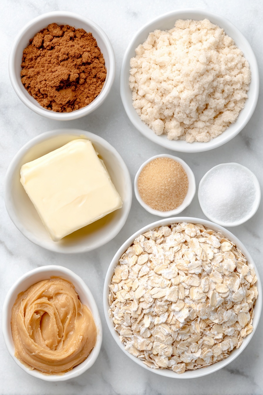 Peanut Butter Oatmeal Cookies, healthy peanut butter cookies, chewy oatmeal cookies, easy cookie recipes, nutty cookie treats - Flat lay of old fashioned oats loosely piled, a small mound of all-purpose flour, a few grains of light brown sugar in a small white ceramic bowl, a few granules of white granulated sugar in a small white ceramic bowl, a small pinch of kosher salt, a tiny heap of ground cinnamon, a few tablespoons of softened unsalted butter in a simple white ceramic bowl, creamy peanut butter dolloped in a white ceramic bowl, one large whole egg with clean shell, and a small white ceramic bowl holding clear vanilla extract placed on a clean white marble surface, soft natural light, photo taken with an iPhone, professional food photography style, fresh ingredients, white ceramic bowls, no bottles, no duplicates, no utensils, no packaging --ar 2:3 --v 7 --p m7354615311229779997