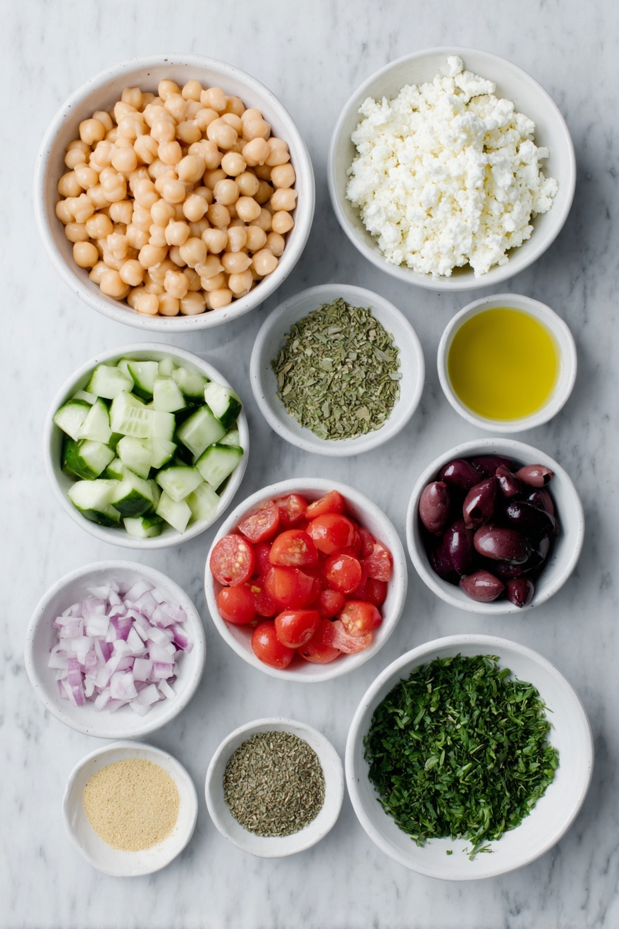 Quick Mediterranean Chickpea Salad, Mediterranean Chickpea Salad, Easy Chickpea Salad, Healthy Mediterranean Salad, Vegan Chickpea Salad - Flat lay of a small white ceramic bowl filled with fresh, plump chickpeas, a small white ceramic bowl of chopped cucumber, a small white ceramic bowl of halved cherry tomatoes, a small white ceramic bowl holding diced red bell pepper, a small white ceramic bowl with sliced deep purple kalamata olives, a small white ceramic bowl containing finely chopped red onion, a small white ceramic bowl of crumbled white feta cheese, a small white ceramic bowl with chopped fresh green parsley, a small white ceramic bowl of golden extra virgin olive oil, a small white ceramic bowl of deep red wine vinegar, a small white ceramic bowl holding smooth pale yellow Dijon mustard powder, and small white ceramic bowls with dried oregano, garlic powder, kosher salt, and ground black pepper, all ingredients arranged symmetrically and balanced, placed on a clean white marble surface, soft natural light, photo taken with an iPhone, professional food photography style, fresh ingredients, white ceramic bowls, no bottles, no duplicates, no utensils, no packaging --ar 2:3 --v 7 --p m7354615311229779997