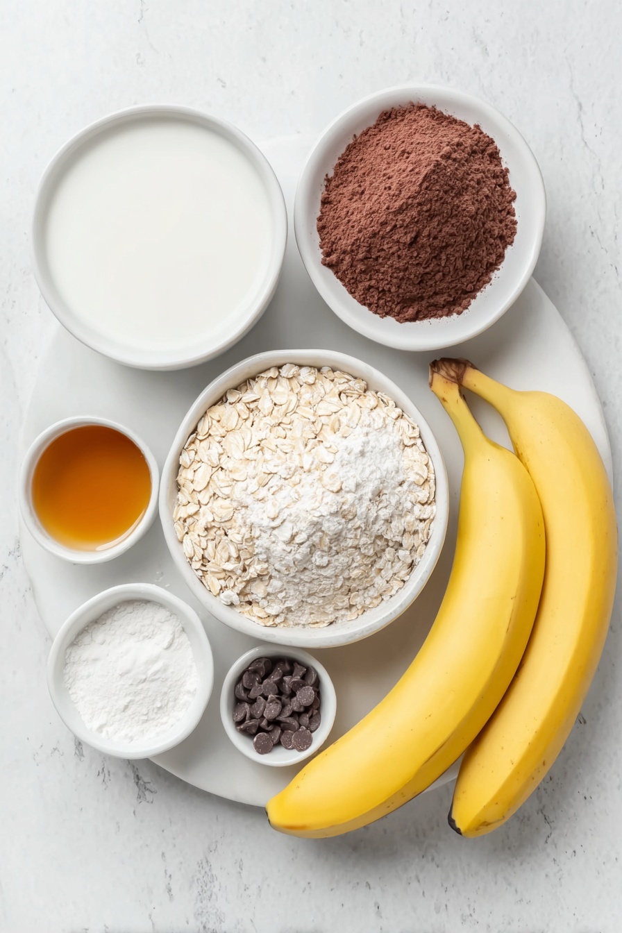 Chocolate Banana Baked Oatmeal, healthy baked oatmeal recipes, easy breakfast ideas with bananas, chocolate breakfast dishes, wholesome breakfast recipes - Flat lay of two ripe bananas, a small mound of cashew butter on a white ceramic plate, a small white bowl filled with unsweetened almond milk, a small white bowl holding pure maple syrup, a small white bowl containing vanilla extract, a neat pile of rolled oats, a small white bowl with unsweetened cocoa powder, a small white bowl of baking powder, a small pinch of salt on a white ceramic dish, and a few chocolate chips scattered on a white ceramic plate, all arranged in perfect symmetry, placed on a clean white marble surface, soft natural light, photo taken with an iPhone, professional food photography style, fresh ingredients, white ceramic bowls, no bottles, no duplicates, no utensils, no packaging --ar 2:3 --v 7 --p m7354615311229779997