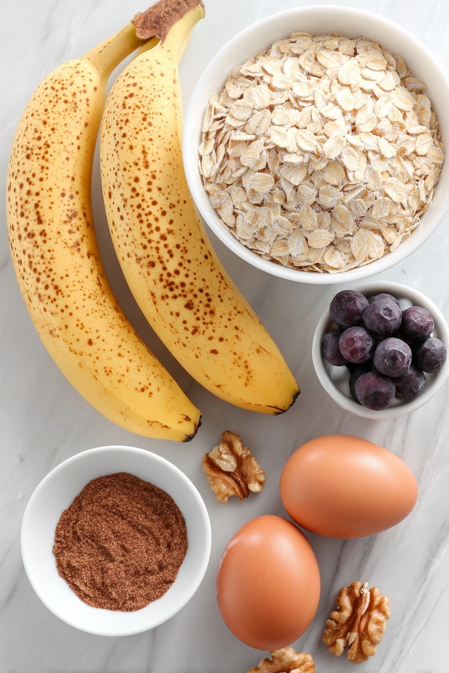 Healthy Banana Oatmeal Pancakes, healthy pancake recipes, nutritious breakfast ideas, easy oatmeal banana pancakes, gluten-free breakfast ideas - Flat lay of two ripe bananas with natural brown speckles, two whole uncracked brown eggs, a small white ceramic bowl filled with rolled oats, a small white bowl holding ground cinnamon powder, a few fresh blueberries scattered beside a small pile of walnut halves, all arranged symmetrically and balanced, placed on a clean white marble surface, soft natural light, photo taken with an iPhone, professional food photography style, fresh ingredients, white ceramic bowls, no bottles, no duplicates, no utensils, no packaging --ar 2:3 --v 7 --p m7354615311229779997